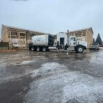 Jagen Hydrovac services truck trenching lines at a new shop build