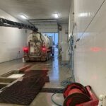 Jagen Hydrovac removing debris from pits at a car wash